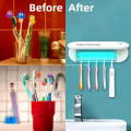 Bathroom toothbrush holder sterilizer